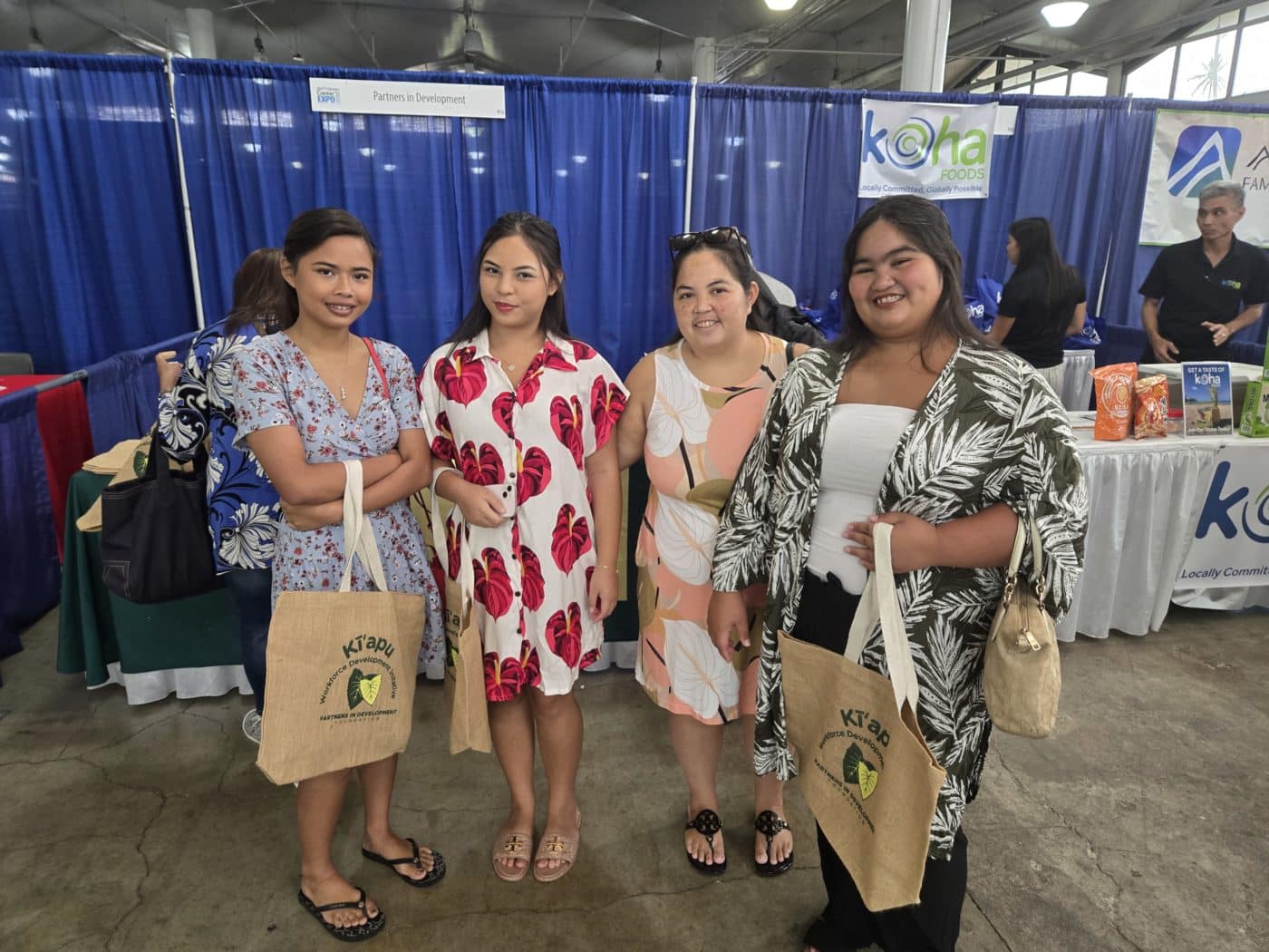 Rayjia (second from left), her mother (second from right), and friends at the 2025 Honolulu Career Expo
